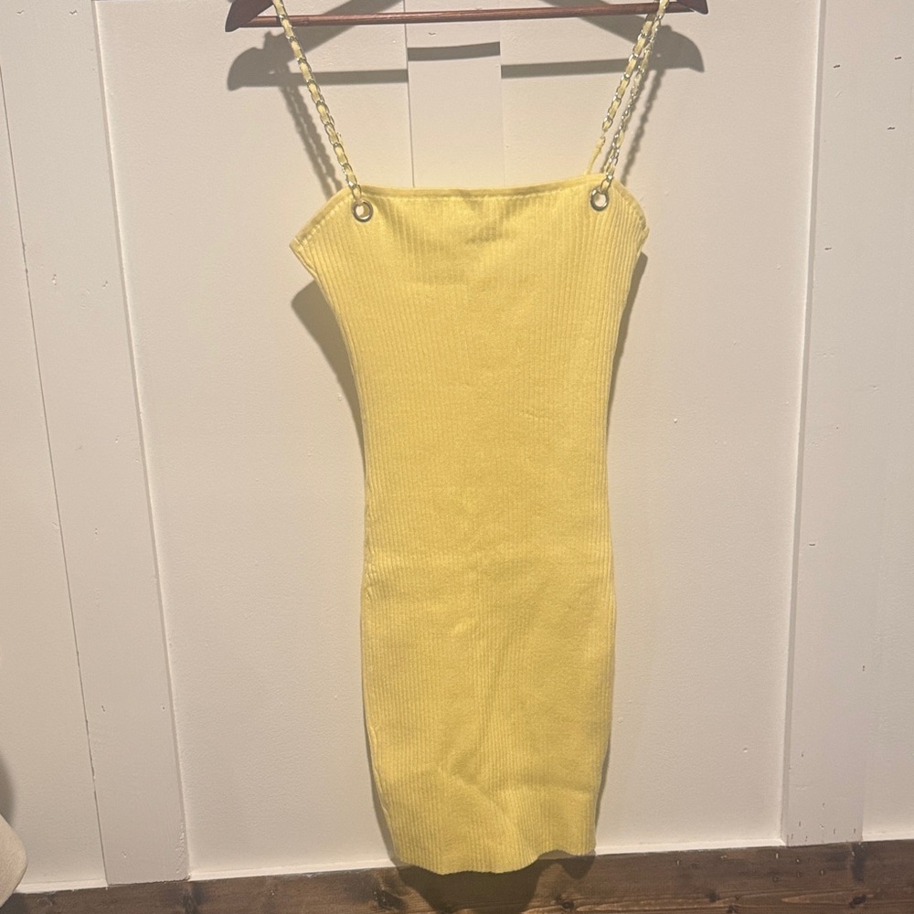 Super Cute Spaghetti Strap Yellow Knit Dress with chain design on straps.